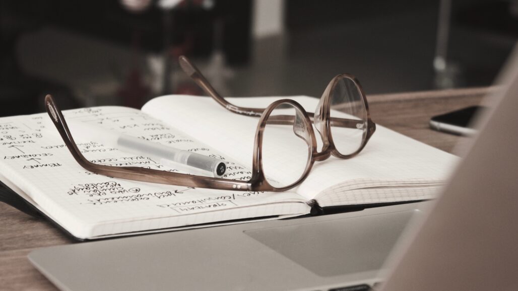 PhD - Notebook with glasses